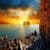 Man swimming on ocean in splendid sunset Wallpaper